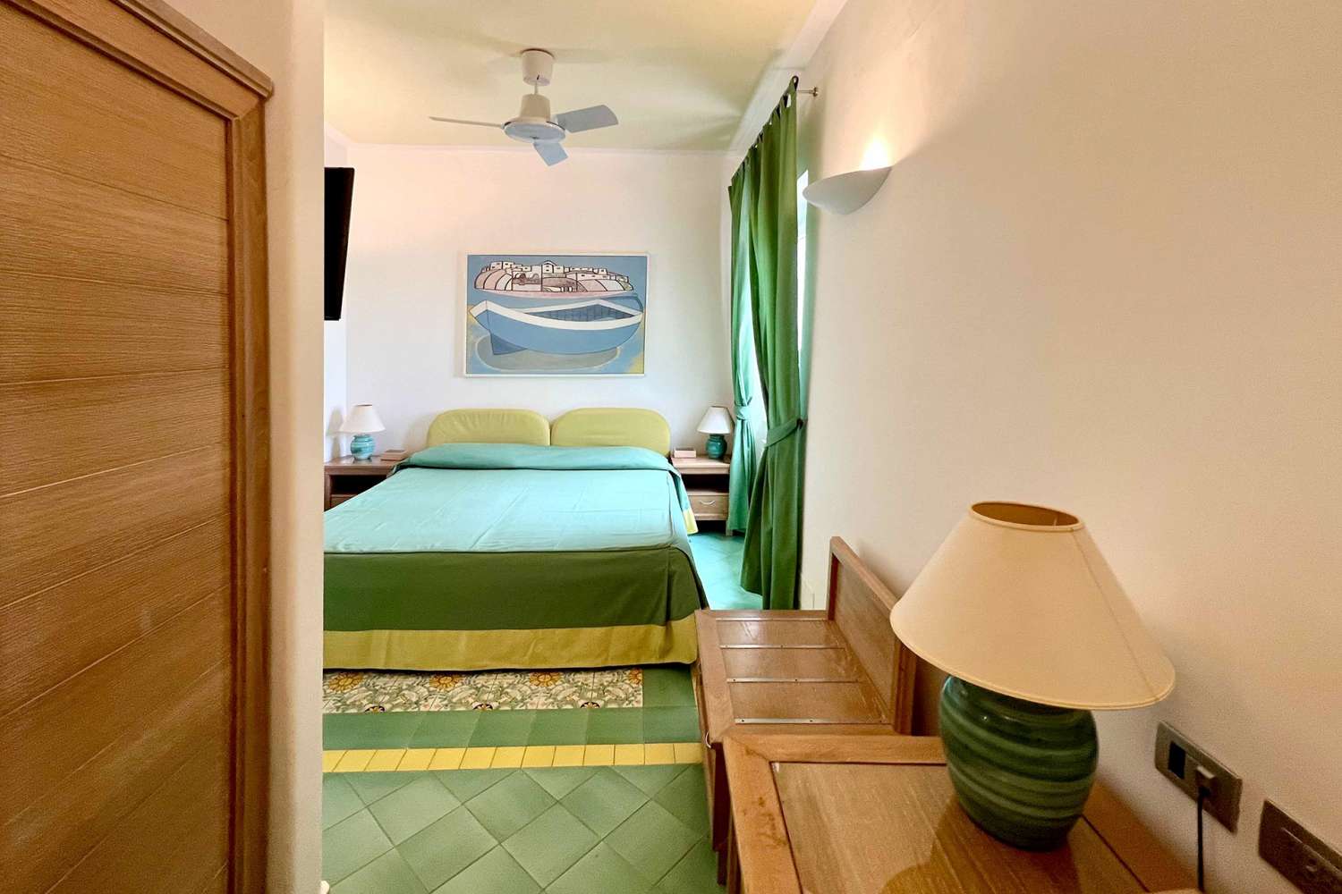 Junior Suite con finestra vista giardino Junior Suite con finestra vista giardino